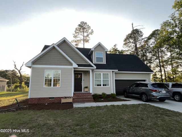 craftsman house featuring an attached garage, crawl space, driveway, and a front yard