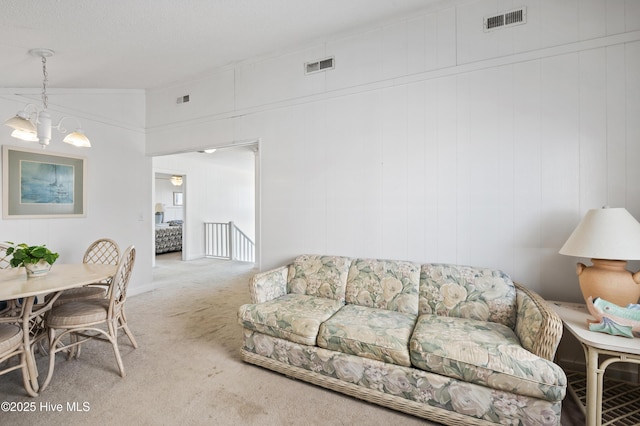 dining space featuring light colored carpet, lofted ceiling, and an inviting chandelier