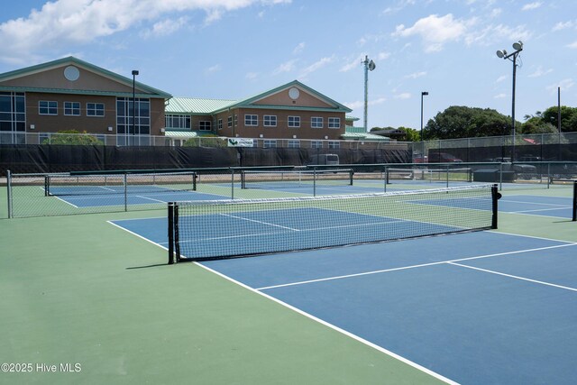 view of sport court with community basketball court and fence