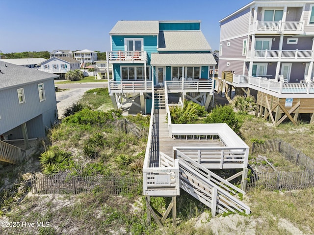 exterior space with a deck with water view