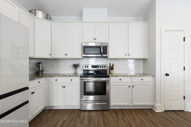 kitchen featuring white cabinetry, appliances with stainless steel finishes, and dark wood finished floors