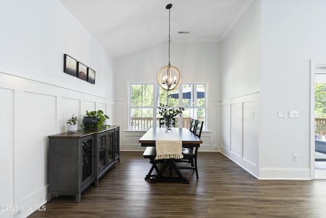 dining area featuring an inviting chandelier, ornamental molding, visible vents, a decorative wall, and dark wood-style floors