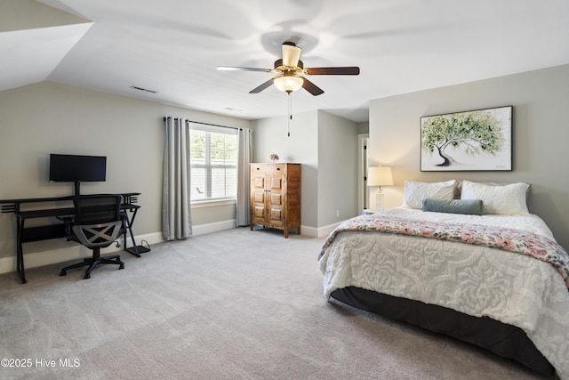 bedroom featuring ceiling fan, light carpet, baseboards, lofted ceiling, and visible vents