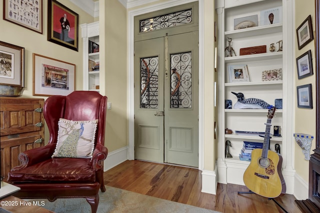 2220 Bel Arbor Pl, Wilmington, NC 28403 - sitting room with wood finished floors and built in features