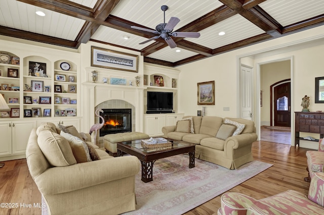 2220 Bel Arbor Pl, Wilmington, NC 28403 - living area with ceiling fan, a glass covered fireplace, built in features, wood finished floors, and recessed lighting