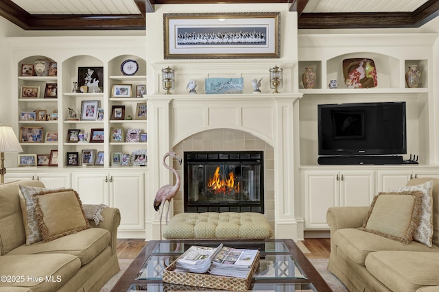 2220 Bel Arbor Pl, Wilmington, NC 28403 - living room with a tile fireplace, wood finished floors, crown molding, built in features, and beam ceiling
