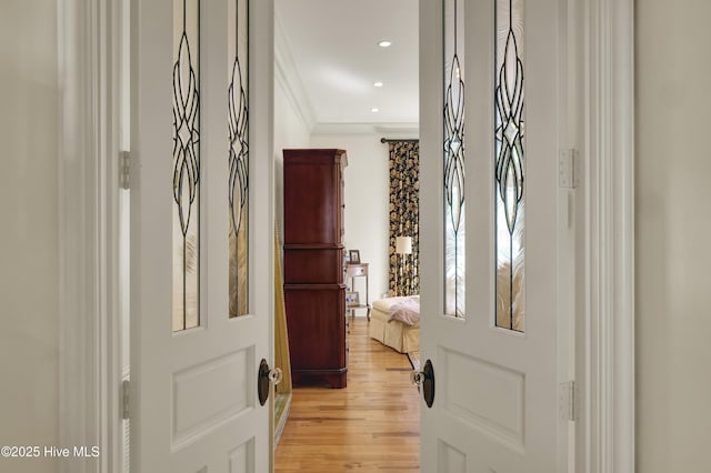 2220 Bel Arbor Pl, Wilmington, NC 28403 - hallway with ornamental molding, light wood finished floors, and recessed lighting