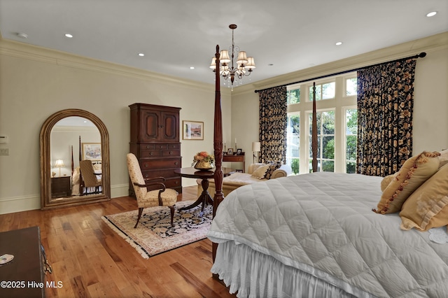 2220 Bel Arbor Pl, Wilmington, NC 28403 - bedroom featuring crown molding, a chandelier, wood finished floors, and recessed lighting