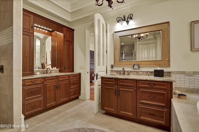 2220 Bel Arbor Pl, Wilmington, NC 28403 - full bathroom featuring a chandelier, ornamental molding, two vanities, a bath, and a tile shower