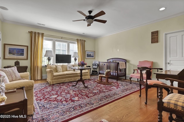 2220 Bel Arbor Pl, Wilmington, NC 28403 - living area with ceiling fan, crown molding, wood finished floors, and recessed lighting