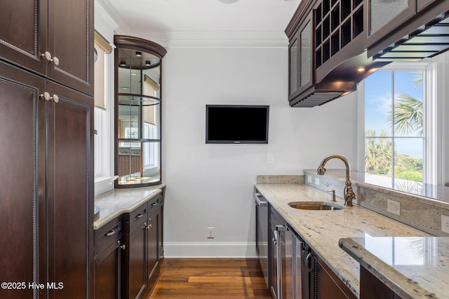 805 S Lumina Ave, Wrightsville Beach, NC 28480 - kitchen featuring a sink, wine cooler, crown molding, dark wood-style flooring, and baseboards