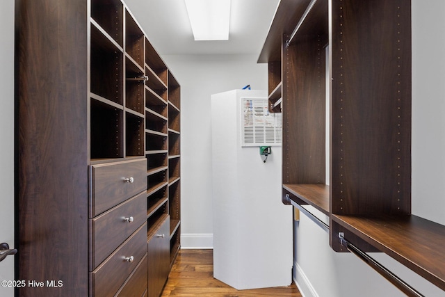 805 S Lumina Ave, Wrightsville Beach, NC 28480 - walk in closet featuring a heating unit and wood finished floors