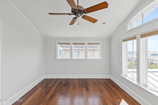 805 S Lumina Ave, Wrightsville Beach, NC 28480 - empty room featuring dark wood-type flooring, baseboards, and ornamental molding