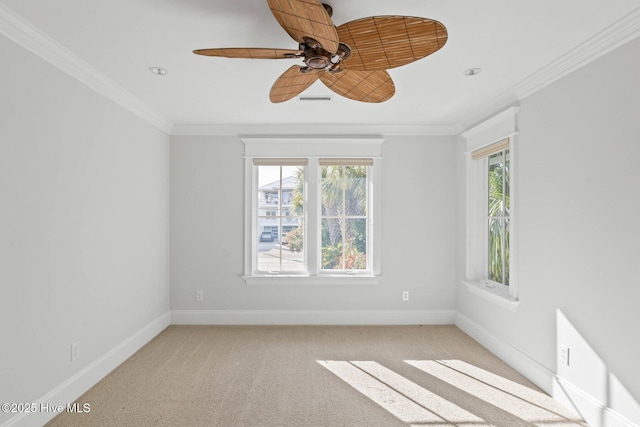 805 S Lumina Ave, Wrightsville Beach, NC 28480 - empty room featuring crown molding, visible vents, baseboards, and a ceiling fan