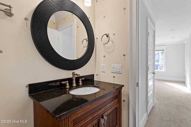 805 S Lumina Ave, Wrightsville Beach, NC 28480 - bathroom featuring crown molding, baseboards, and vanity