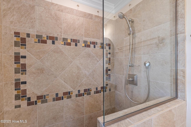 805 S Lumina Ave, Wrightsville Beach, NC 28480 - bathroom with ornamental molding and tiled shower