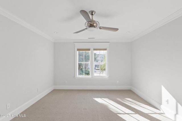 805 S Lumina Ave, Wrightsville Beach, NC 28480 - unfurnished room with light colored carpet, crown molding, baseboards, and a ceiling fan
