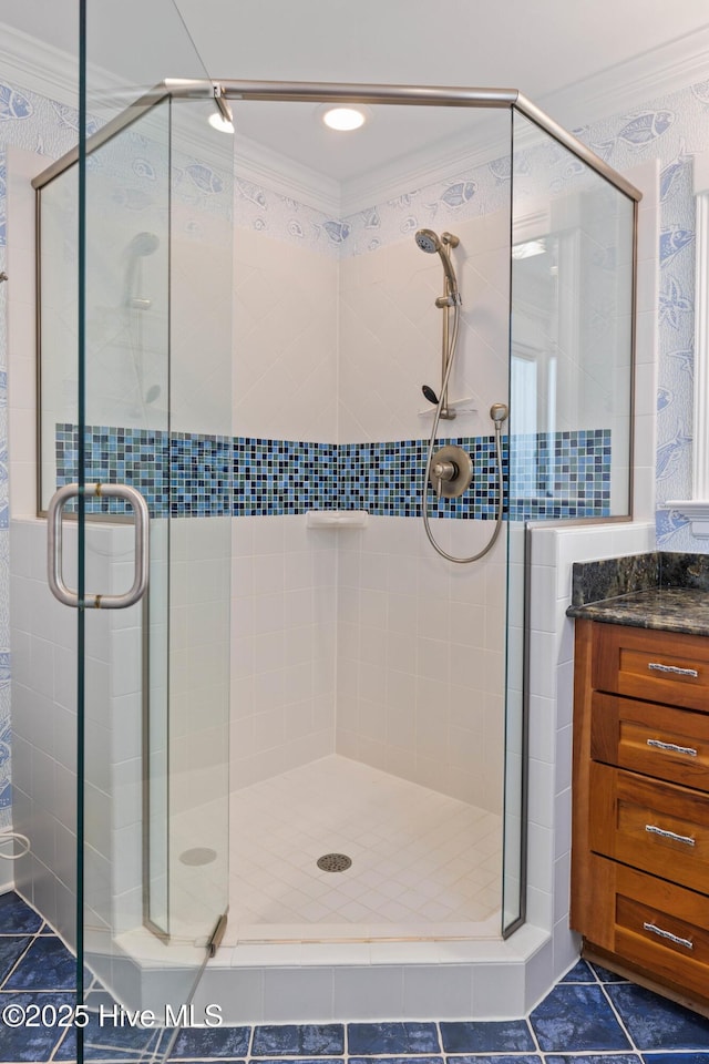 805 S Lumina Ave, Wrightsville Beach, NC 28480 - bathroom with a shower stall and crown molding