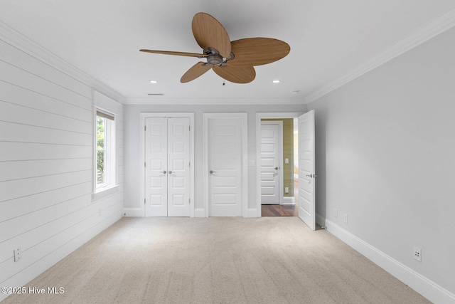 805 S Lumina Ave, Wrightsville Beach, NC 28480 - unfurnished bedroom featuring ornamental molding, carpet floors, baseboards, and recessed lighting
