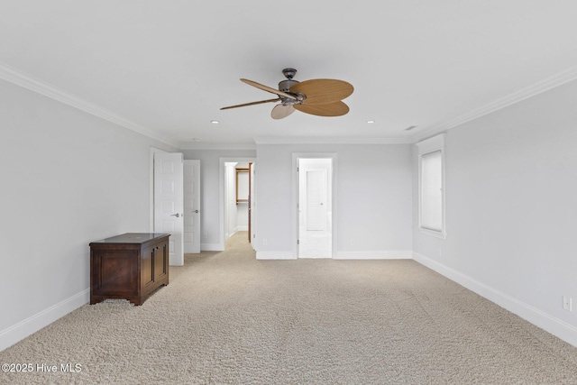 805 S Lumina Ave, Wrightsville Beach, NC 28480 - interior space featuring a ceiling fan, recessed lighting, baseboards, ornamental molding, and light colored carpet