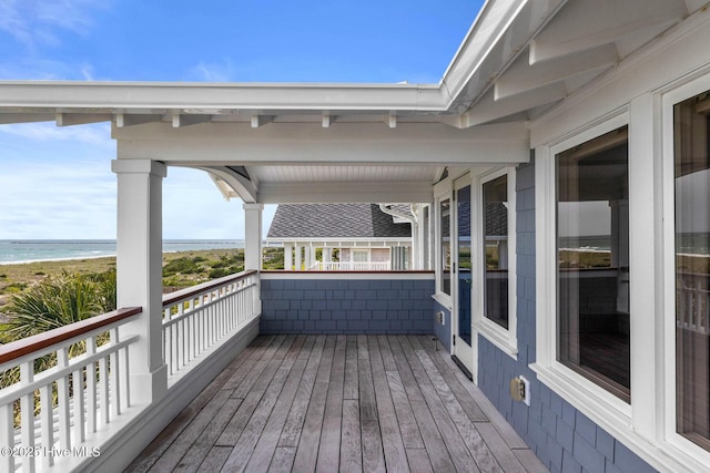 805 S Lumina Ave, Wrightsville Beach, NC 28480 - wooden terrace with a water view and a view of the beach