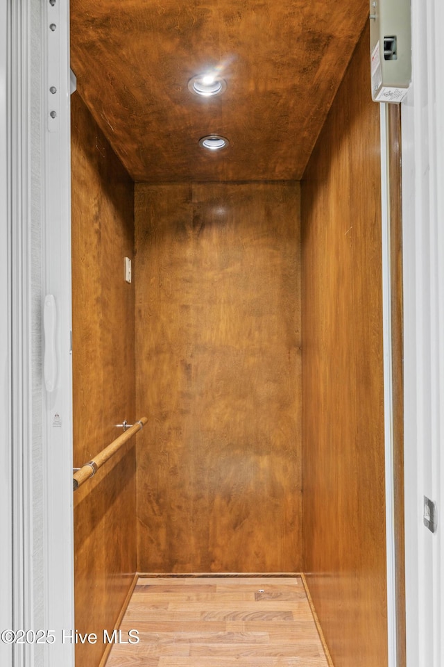 805 S Lumina Ave, Wrightsville Beach, NC 28480 - room details featuring elevator and wood finished floors