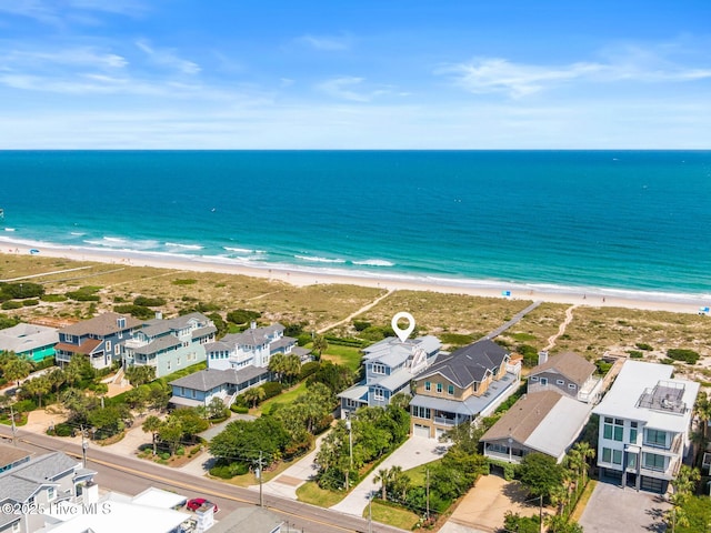 805 S Lumina Ave, Wrightsville Beach, NC 28480 - drone / aerial view featuring a water view and a view of the beach