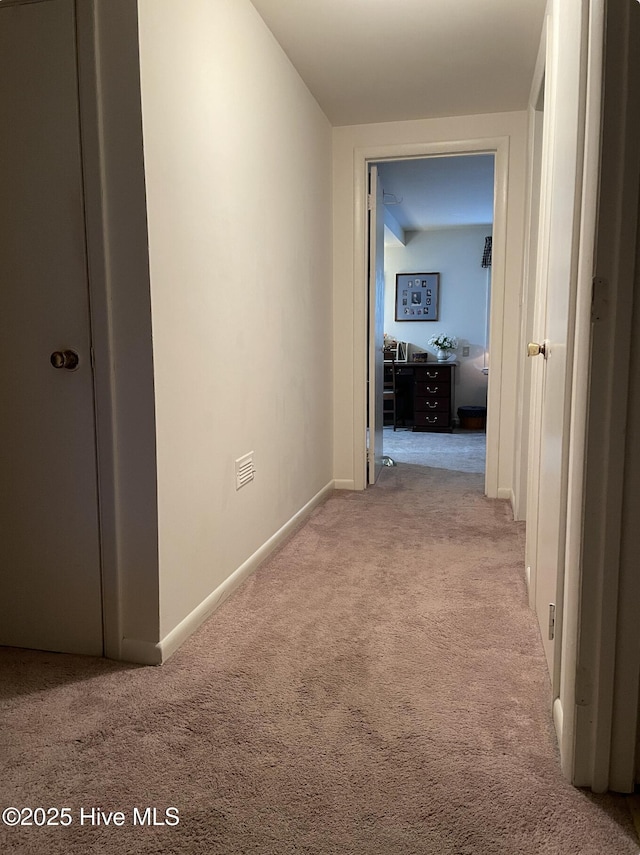 612 Blaney St, Clinton, NC 28328 - corridor featuring baseboards and carpet flooring