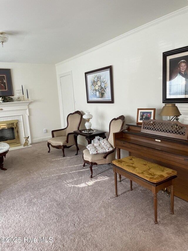 612 Blaney St, Clinton, NC 28328 - living area featuring crown molding, a fireplace with flush hearth, and carpet