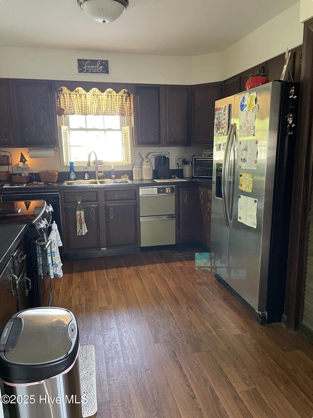 612 Blaney St, Clinton, NC 28328 - kitchen featuring stainless steel refrigerator with ice dispenser, a sink, dishwasher, and dark wood-style floors