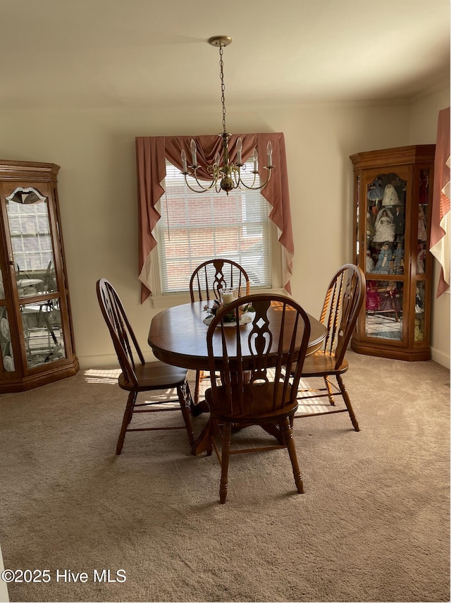 612 Blaney St, Clinton, NC 28328 - carpeted dining area featuring a chandelier