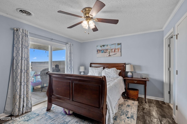 415 W Boardwalk Blvd, Atlantic Beach, NC 28512 - bedroom with access to outside, wood finished floors, a textured ceiling, crown molding, and baseboards