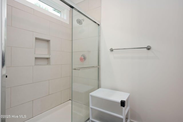 full bathroom featuring a stall shower