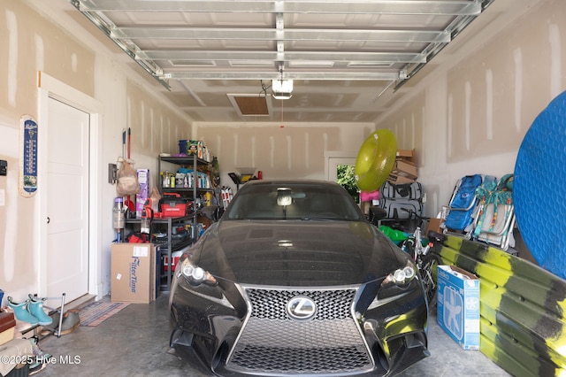 garage featuring a garage door opener