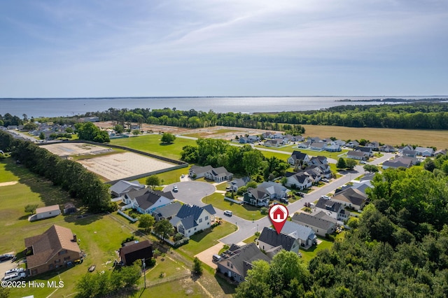 aerial view featuring a water view and a residential view