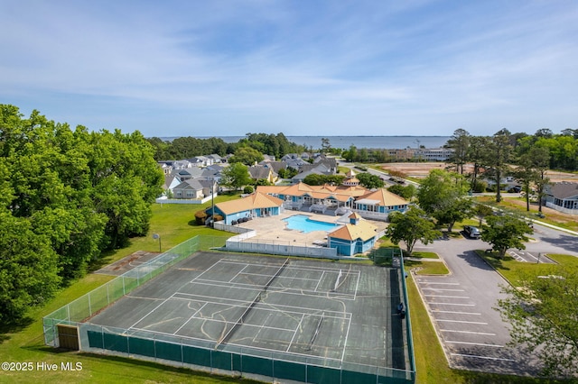 birds eye view of property with a residential view