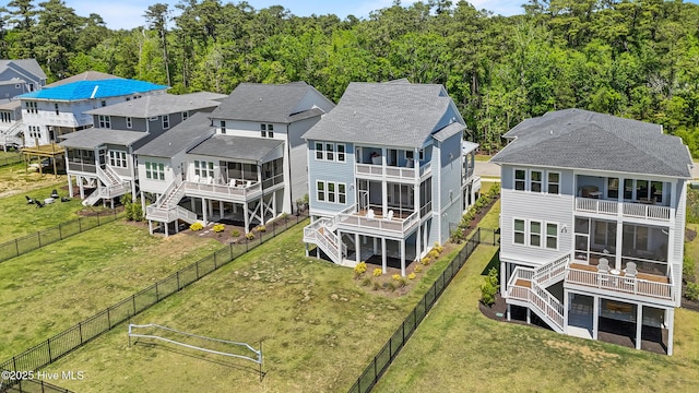 birds eye view of property with a residential view