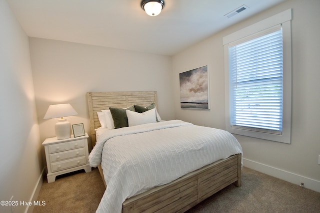 218 Country Club Dr SW, Shallotte, NC 28470 - bedroom featuring carpet floors, baseboards, and visible vents
