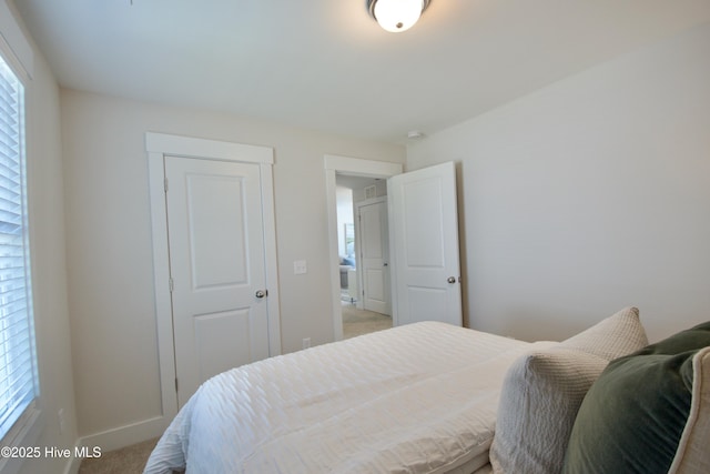 218 Country Club Dr SW, Shallotte, NC 28470 - bedroom with baseboards and carpet