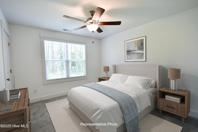 218 Country Club Dr SW, Shallotte, NC 28470 - carpeted bedroom featuring visible vents, a ceiling fan, and baseboards