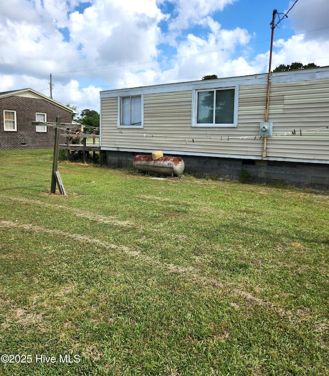exterior space with a yard