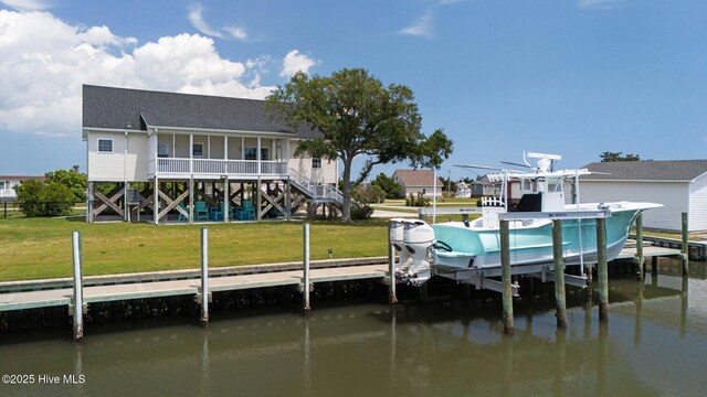 dock with a water view and boat lift