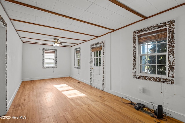 2205 Bay St, Morehead City, NC 28557 - unfurnished room with light wood-type flooring, baseboards, and ceiling fan