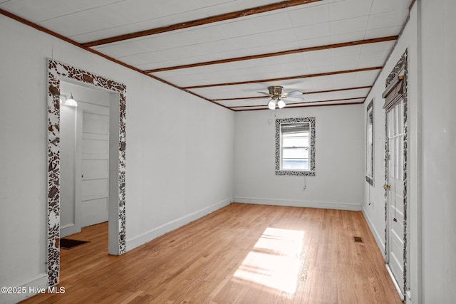 2205 Bay St, Morehead City, NC 28557 - unfurnished bedroom with baseboards, light wood finished floors, and visible vents