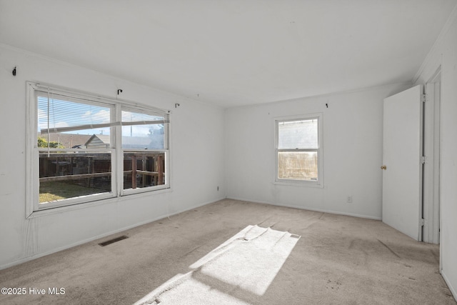 2205 Bay St, Morehead City, NC 28557 - empty room with light colored carpet and visible vents