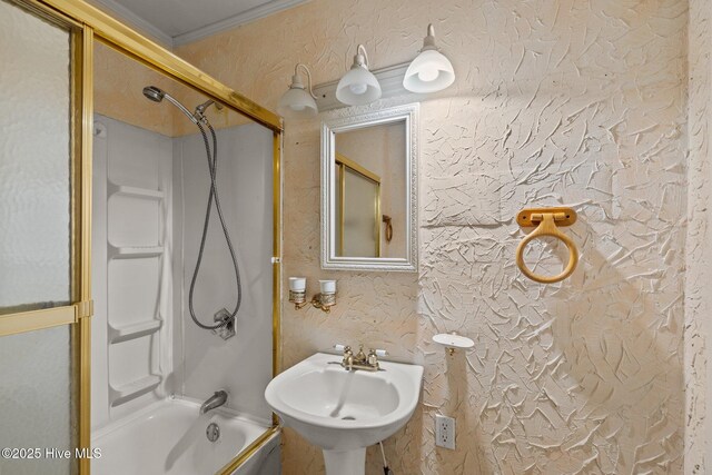 2205 Bay St, Morehead City, NC 28557 - bathroom featuring a sink, shower / bathtub combination, a textured wall, and crown molding