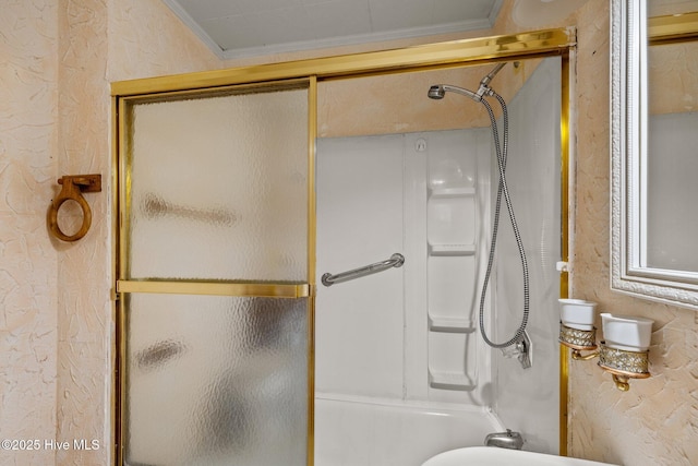 2205 Bay St, Morehead City, NC 28557 - bathroom featuring crown molding, a shower with door, and a textured wall