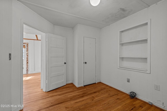 2205 Bay St, Morehead City, NC 28557 - unfurnished bedroom featuring light wood-type flooring
