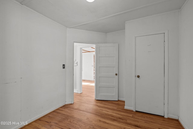 2205 Bay St, Morehead City, NC 28557 - interior space with baseboards, ornamental molding, and wood finished floors