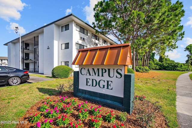 448 Racine Dr Unit G117, Wilmington, NC 28403 - community sign with a lawn